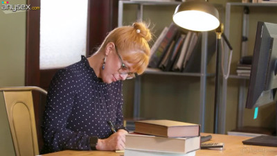 Nerdy librarian Penny Pax gets nasty and licks two juicy pussies right on the table