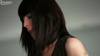 Tall leggy brunette Carol Vega in black stockings demonstrates how to suck cock