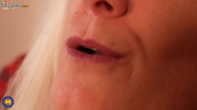 Mature Busty GILF meets a BBC for a blowjob and sex on the couch