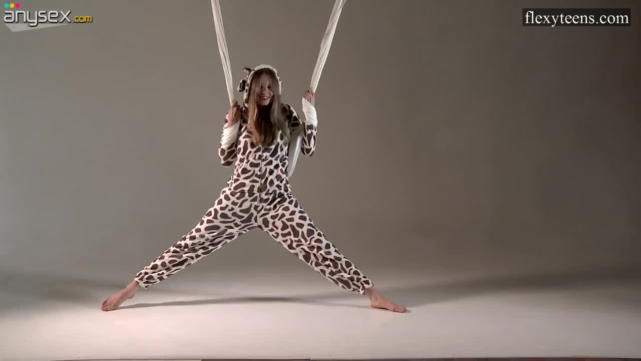 Flexible Russian gymnast Sofia Zhiraf gets naked in the aerial hammock Free Porn Videos | ePornAny.