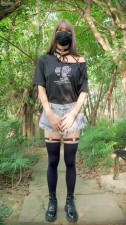 A cute ladyboy from China publicly enjoys masturbation right in the park.
