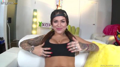 Tattooed sassy hooker Karmen Karma shows her gaped anus closeup