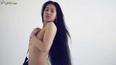 Slender Asian hottie Emma gets naked in her first solo video