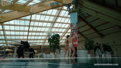 Underwater strip tease by naughty babe Marusia and her pretty girlfriend