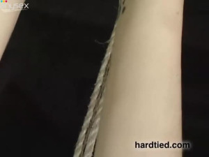 Red haired actress with pierced nipples is spanked in the dark room