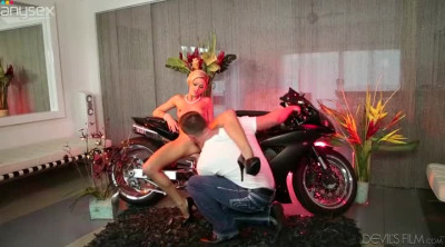 Classy looking MILF sucking biker's hard dick greedily
